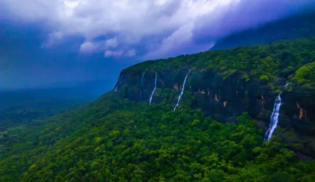 Monsoon waterfalls down the cliff below Nagphani peak at Bhimashankar