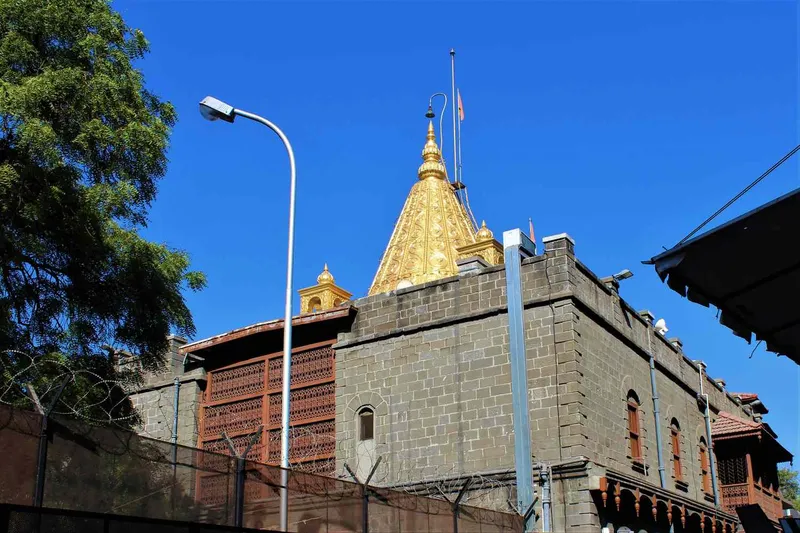 Shirdi Sai Baba Temple golden spire exterior - book cab from Pune to Shirdi
